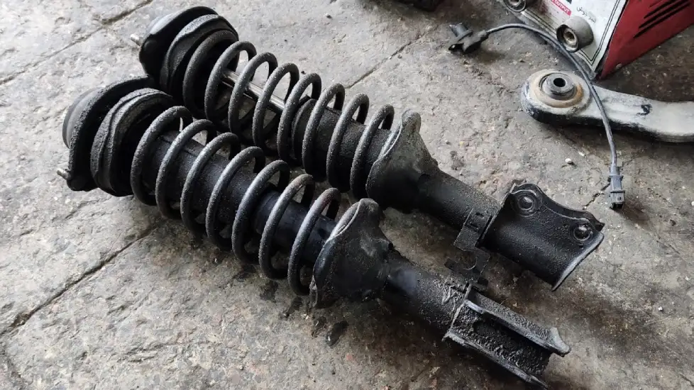 تعمیر کمک فنر جنسیس